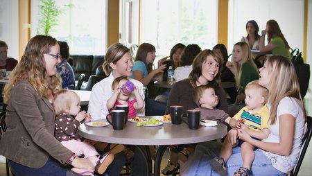 Group Of Young Mothers Relaxing In Cafe Image-45952